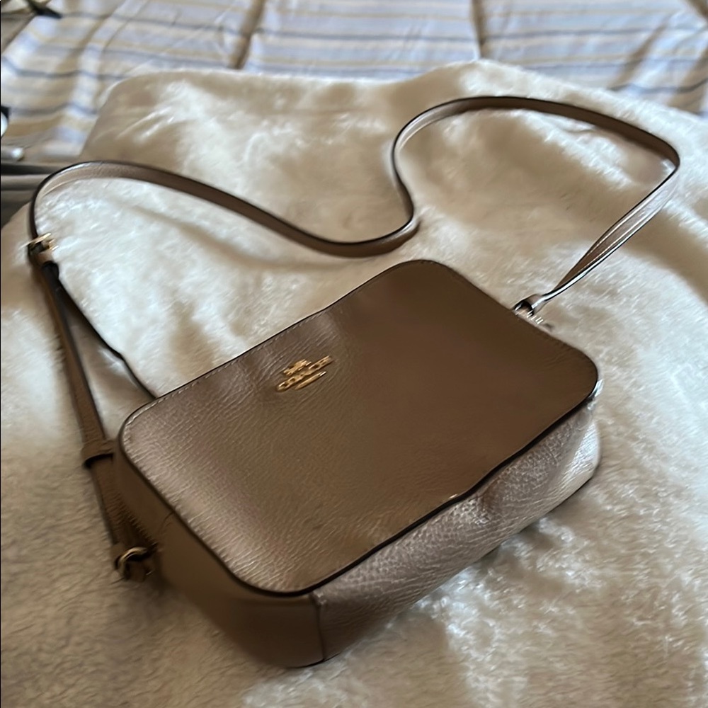 Coach Tan Crossbody Bag with Adjustable Strap and Gold Hardware